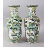 A PAIR OF 19TH CENTURY CHINESE ROULEAU PORCELAIN VASES, the body of the vases with panels