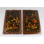 A PAIR OF 19TH CENTURY QAJAR HAND PAINTED BOOK COVERS, deer hunting, 26cm x 19cm.