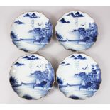 A SET OF FOUR JAPANESE MEIJI PERIOD BLUE AND WHITE PORCELAIN SCALLOPED DISHES, all painted with