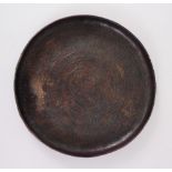 A RARE 12TH-13TH CENTURY PERSIAN SELJUK ENGRAVED CIRCULAR BRONZE DISH, 29cm diameter x 3.5cm deep.