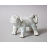 A GOOD JAPANESE EARLY MEIJI PERIOD HIRADO STYLE PORCELAIN FIGURE OF A SHI SHI DOG, stood in a