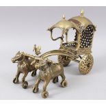 AN 18TH-19TH CENTURY INDIAN BRASS CHILDS TOY CHARIOT being pulled by two horses, 27cm long.
