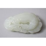 A GOOD 19TH CENTURY CHINESE CARVED JADE / NEPHRITE PEBBLE OF GOOSE, the pebble caved to depict a