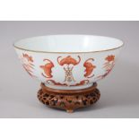 A GOOD 19TH CENTURY CHINESE IRON RED FAMILLE ROSE PORCELAIN BOWL & STAND, the bowl decorated to