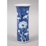 A SMALL 19TH CENTURY CHINESE BLUE & WHITE PRUNUS PORCELAIN SPILL VASE, 12CM HIGH.