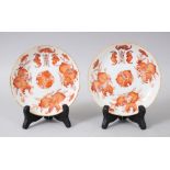A GOOD PAIR OF CHINESE GUANGXU PERIOD IRON RED PORCELAIN SAUCERS AND STANDS, each decorated with