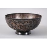 A SUPERB 19TH CENTURY INDIAN BIDRI SILVER INLAID CIRCULAR BOWL, 12cm diameter x 6.5cm high.