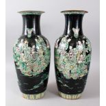 A GOOD PAIR OF 19TH CENTURY CHINESE FAMILLE NOIR PORCELAIN VASES, the body of each vase with