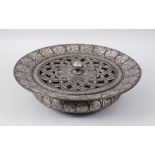 A SUPERB EARLY 19TH CENTURY INDIAN BIDRI SILVER INLAID CIRCULAR BASIN with pierced cover with