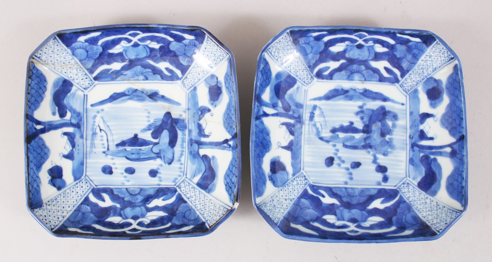 A PAIR OF 18TH CENTURY JAPANESE BLUE & WHITE IMARI PORCELAIN DISHES, the dishes both depicting