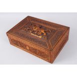 A 19TH CENTURY PERSIAN QAJAR CARVED FRUITWOOD BOX, probably Shiraz, the top carved with an unusual