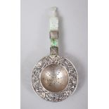 A GOOD 19TH CENTURY CHINESE JADEITE & SOLID SILVER TEA STRAINER, the silver bowl with carved