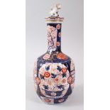 A JAPANESE MEIJI PERIOD FLUTED PORCELAIN IMARI BOTTLE VASE & COVER, then body of the vase with