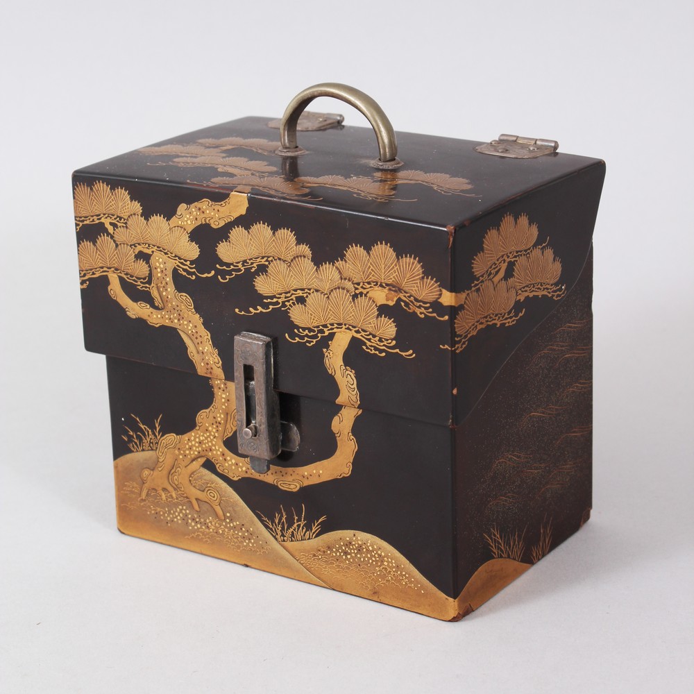 A GOOD JAPANESE MEIJI PERIOD LACQUER CHEST, the gold lacquer decoration depicting scnes of pine