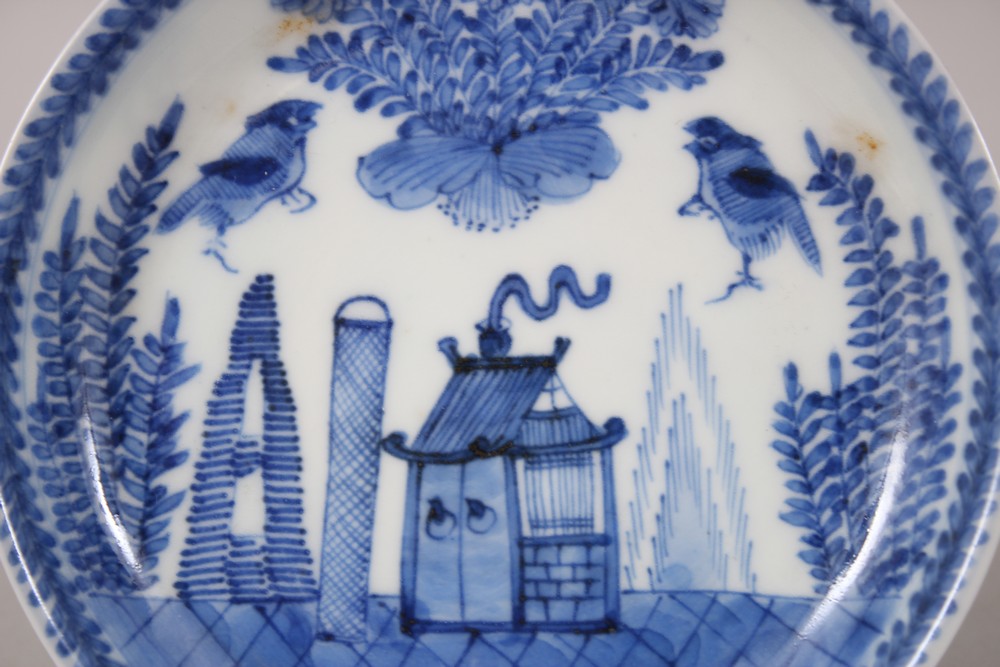 A CHINESE KANGXI BLUE & WHITE PORCELAIN SAUCER DISH, the saucer depicting a landscape scene with - Image 2 of 4