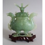 A GOOD 20TH CENTURY CHINESE JADE VASE & COVER, the vase in the form of two mythical duck / phoneix