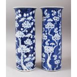 A PAIR OF 19TH CENTURY CHINESE BLUE & WHITE PORCELAIN PRUNUS FLUTED VASES, the vases decorated