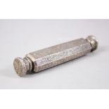 AN EARLY 19TH CENTURY NORTH INDIAN LUCKNOW SILVER DOUBLE SIDED SCENT BOTTLE, 13cm long.