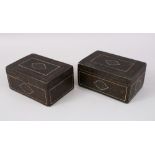 A PAIR OF 19TH CENTURY PERSIAN QAJAR SIGNED LACQUER PAPIER MACHE BOXES AND COVERS, 16cm long x