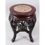 A SMALL 19TH CENTURY CHINESE MARBLE TOP HARDWOOD TABLE / PLANTER, the top inset with marble, the