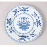 A GOOD CHINESE BLUE & WHITE KANGXI PORCELAIN PLATE, decorated with a basket of floral arrangement,