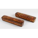 A GOOD PAIR OF LARGE QALAMDAN PAPIER MACHE PEN BOXES, 28cm long.