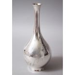 A GOOD JAPANESE MEIJI PERIOD SOLID SILVER VASE FOR HATTORI COMPANY, the body of the vase detailed