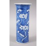 A 19TH CENTURY CHINESE BLUE & WHITE PORCELAIN PRUNUS SPILL VASE, the base bearing a four character