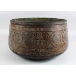 A 15TH CENTURY MAMLUK COPPER BOWL PROBABLY DAMASCUS with calligraphy on the sides, 39cm diameter,