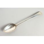 A GEORGE III OLD ENGLISH PATTERN GRAVY SPOON. London 1798. Maker G. S.