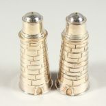 A HEAVY PAIR OF PLATE "LIGHTHOUSE" SALT AND PEPPERS. 9.5cms high.