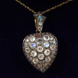 A 9CT GOLD MOONSTONE AND AMETHYST HEART SHAPED LOCKET on a 9ct gold chain, boxed.