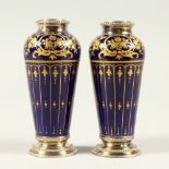 A GOOD PAIR OF 19TH CENTURY MINIATURE PORCELAIN VASES, possibly Sevres, deep blue ground with gilded