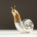 A NOVELTY GLASS SNAIL SCENT BOTTLE with plated plastic head. 6.5cms high.