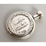 AN EDWARD VII CIRCULAR SCENT BOTTLE, the front with a classical scene. London 1906. 3.5cms