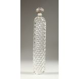 A LARGE 19TH CENTURY WRYTHEN FLUTED GLASS SCENT BOTTLE with screw off silver repousse cap.