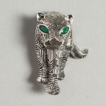A SILVER "ART DECO" PANTHER BROOCH.