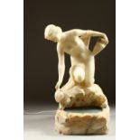 AN UNUSUAL CARVED ALABASTER ILLUMINATED FIGURE, modelled as a seated female nude gathering water