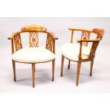 A PAIR OF EDWARDIAN SATINWOOD AND MARQUETRY OPEN ARMCHAIRS, with pierced splats, overstuffed seats