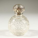 AN EDWARD VII CUT GLASS GLOBULAR SCENT BOTTLE with screw off silver top and band. Birmingham 1908.