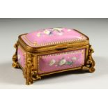 A GOOD 19TH CENTURY PINK ENAMEL AND ORMOLU MOUNTED HINGED CASKET AND COVER, each panel painted