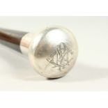 A SILVER MOUNTED EBONY WALKING CANE, with engraved presentation description: PRESENTED TO: PL CMDR