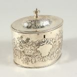 A GEORGE III OVAL TEA CADDY AND COVER with bead edge and floral repousse decoration. London 1804.