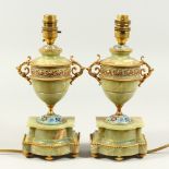 A PAIR OF ALABASTER AND CLOISONNE ENAMEL URN SHAPED TWO HANDLED LAMPS converted to electricity.