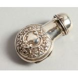 AN EDWARD VII SILVER SCENT BOTTLE CASE (no bottle) with repousse decoration. Birmingham 1902.