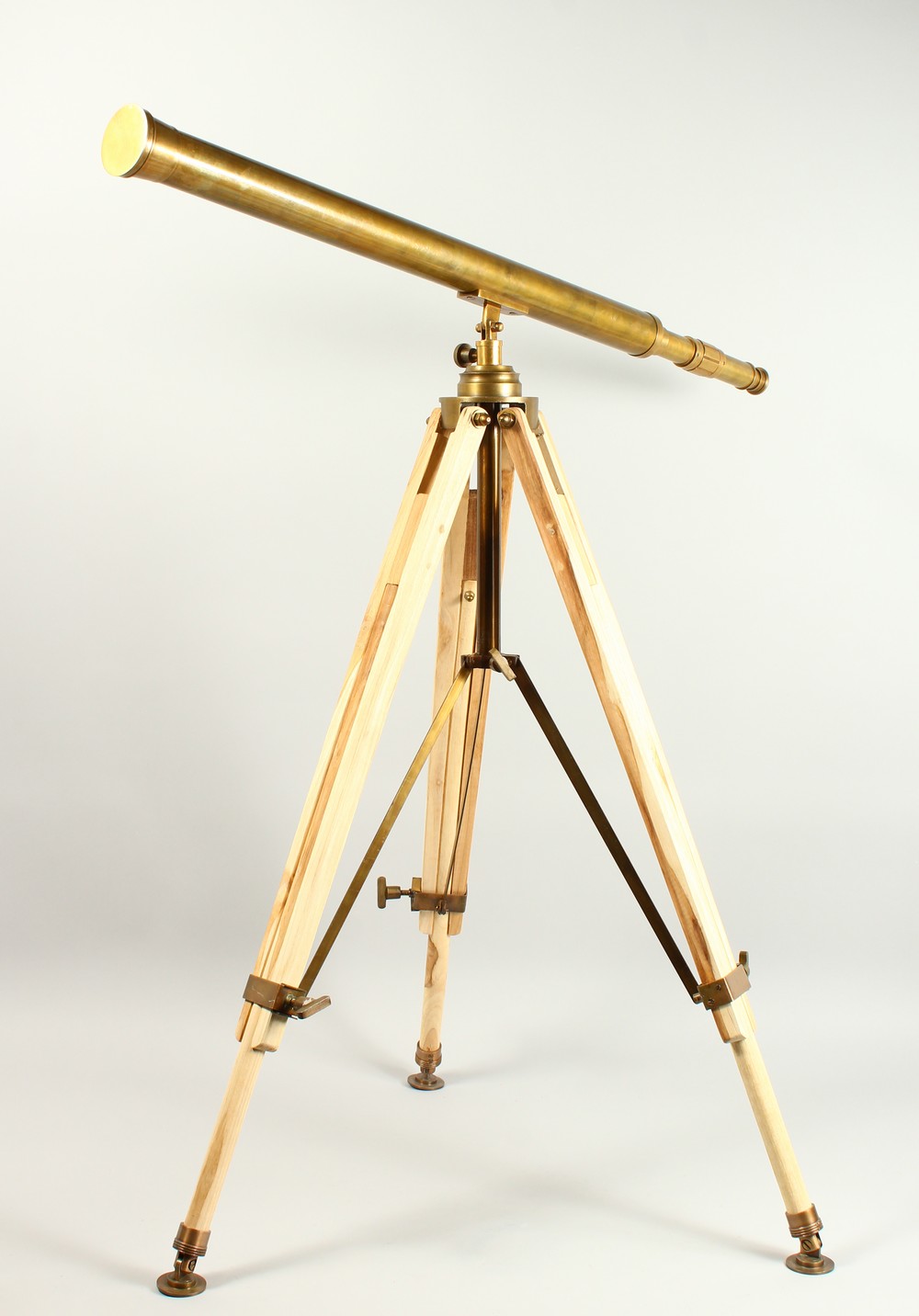 A TELESCOPE ON A STAND.