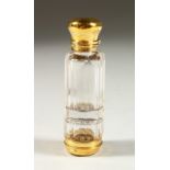 A VICTORIAN FACET CUT GLASS DOUBLE ENDED SCENT BOTTLE with lift off cap with glass stopper, the