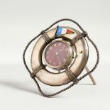 A RARE SILVER LIFE RING with enamel flag and rope decoration around a watch. 3.5cms.