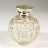 A GEORGE V CUT GLASS GLOBULAR SCENT BOTTLE with silver hinged top. Birmingham 1918. Maker The