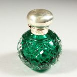 A GOOD HOBNAIL CUT GREEN TINTED GLASS GLOBULAR SCENT BOTTLE AND STOPPER with plain silver top.
